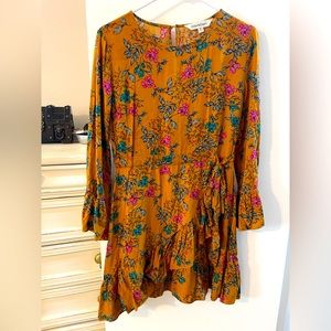 Faux wrap dress, good condition. Need sewn at base of zipper on back (pictured).